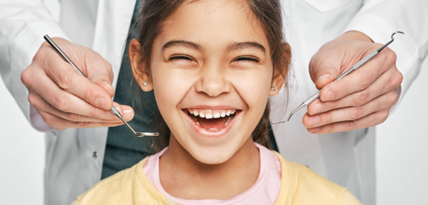 Happy child during pediatric dental visit