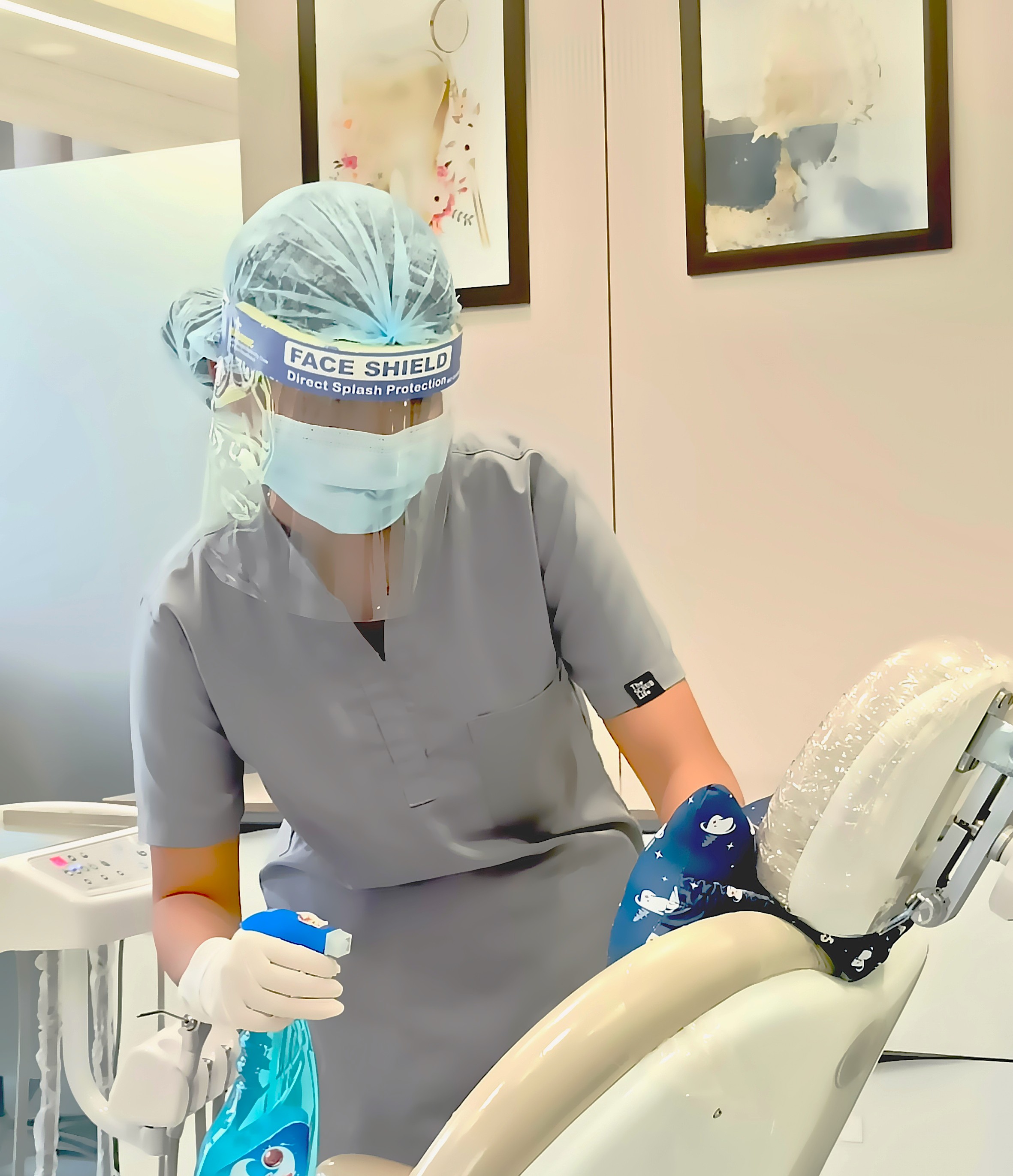 Disinfectant spray on dental chair headrest